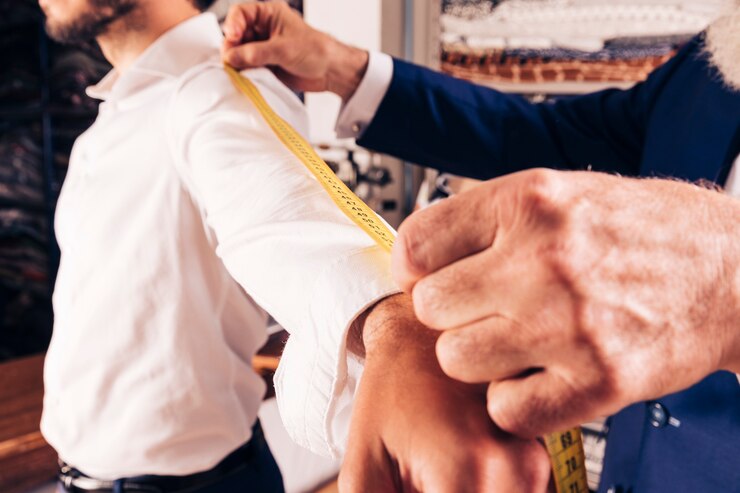 tailor measurement taking customer arm